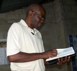 Pastor Daka teaching the Word